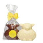 chocolate lamb in both milk and white chocolate, one inside packaging